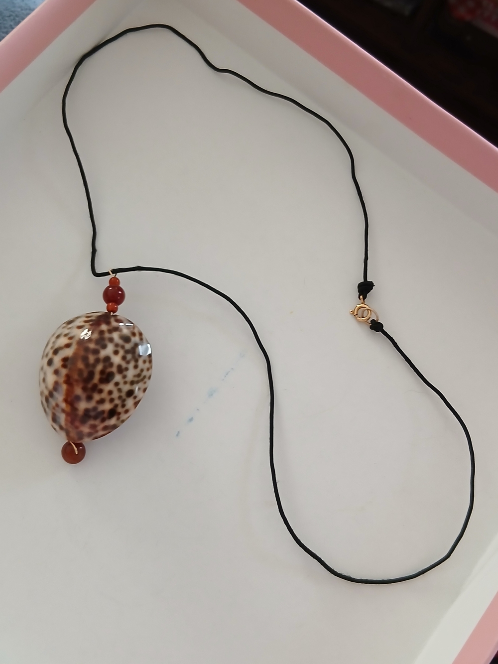 Shell Pendant Necklace with Brown Speckled Shell and Black Cord